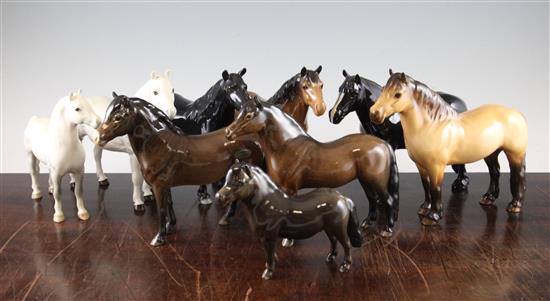 A collection of nine Beswick horses, late 20th century, average length 21cm